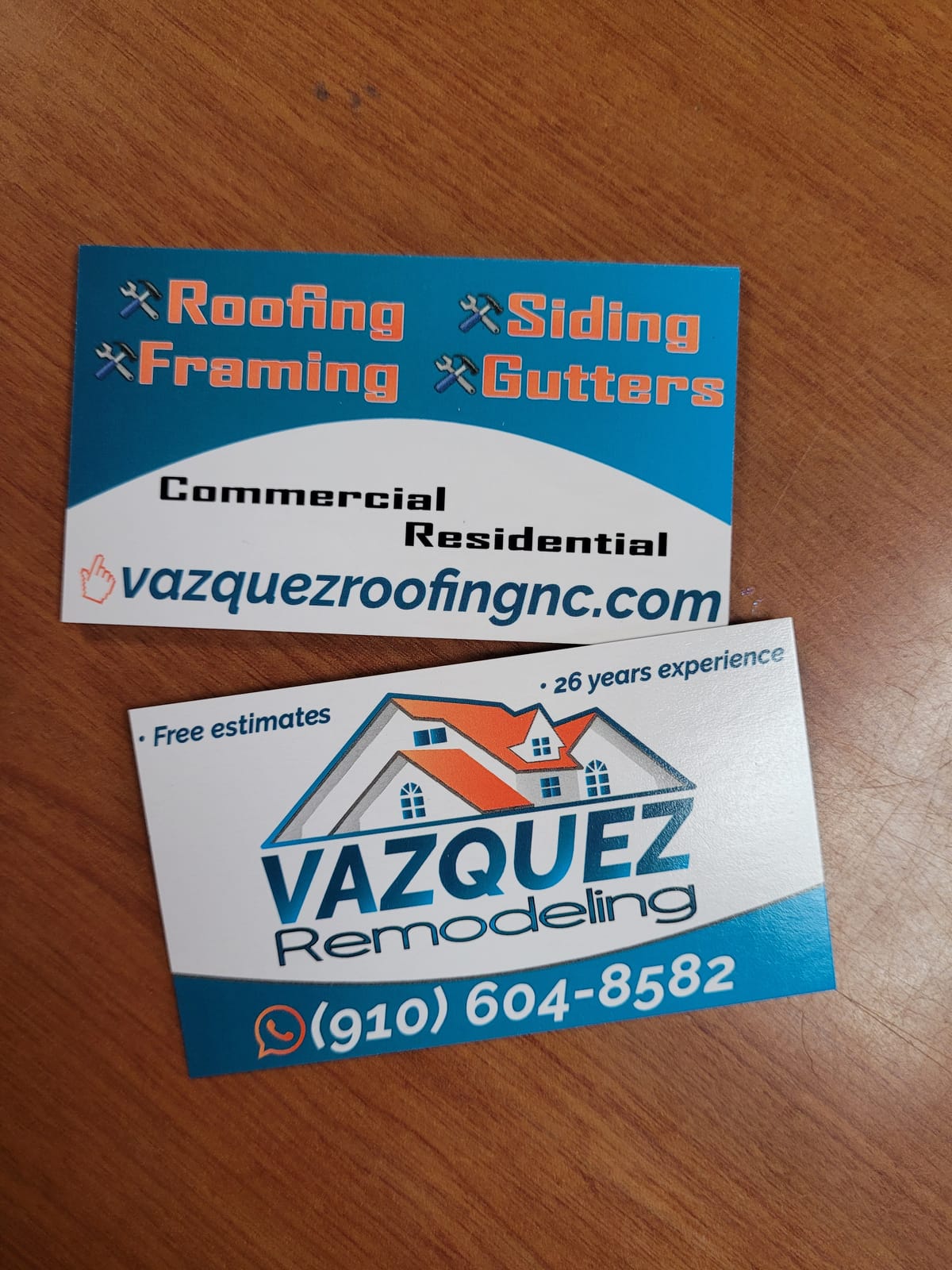 Business cards for Vazquez Remodeling, roofing and siding